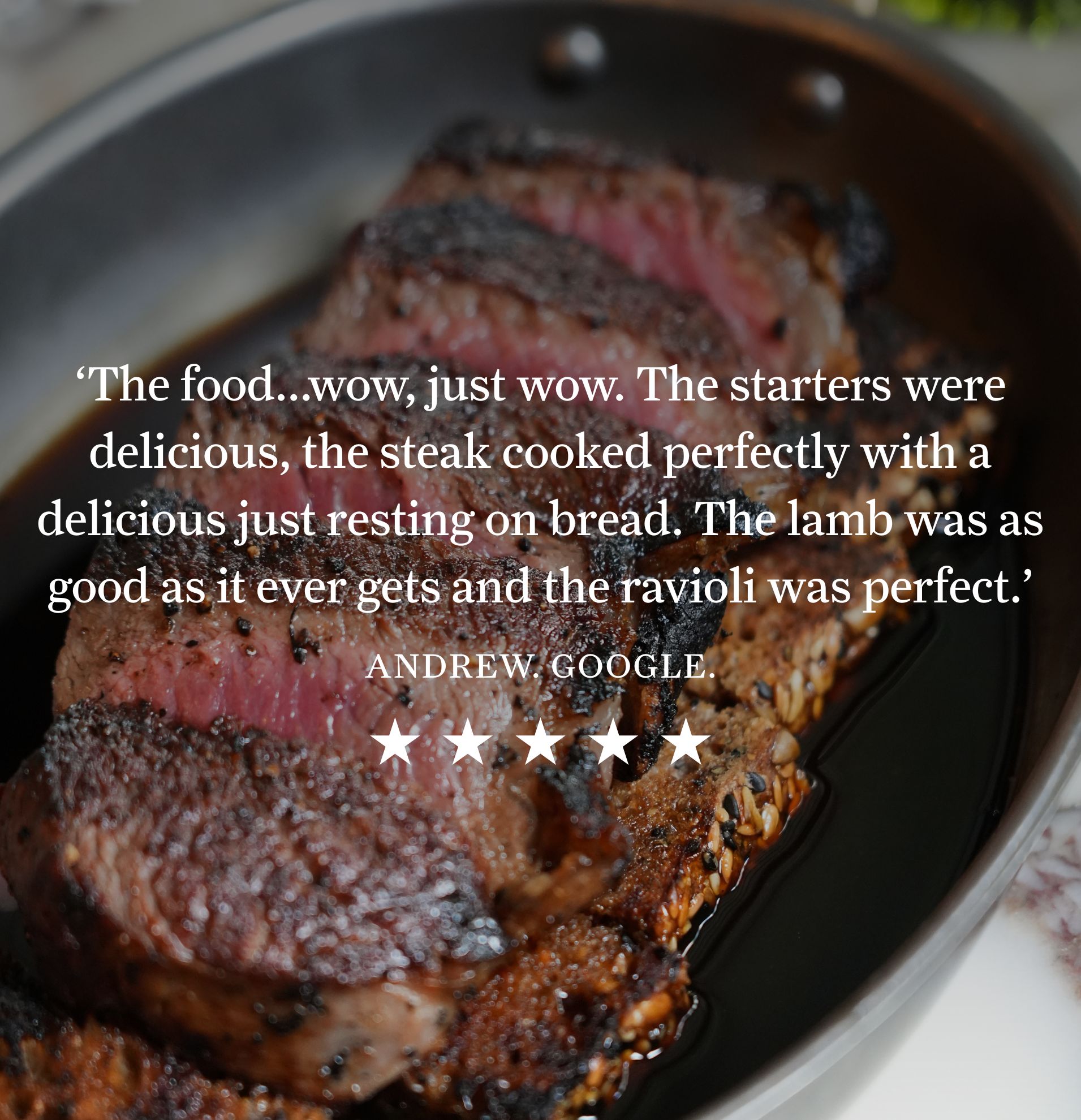 Medium-rare sliced steak resting in a skillet, accompanied by a glowing five-star Google review from Andrew.